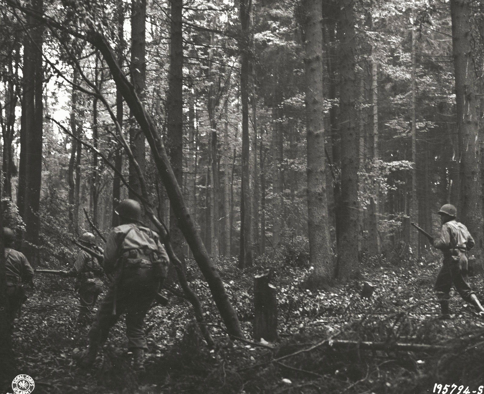 "Infantrymen Pushing through the Hurtgen Forest in Germany." 1944.