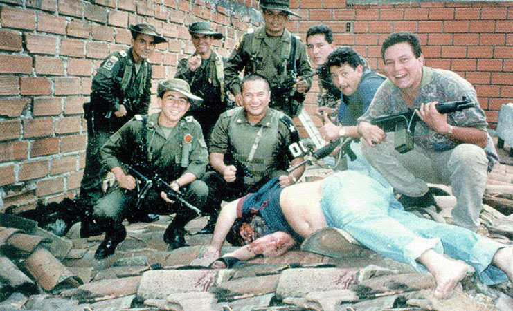 Members of Colonel Martinez's Search Bloc with the body of Pablo Escobar. December 2, 1993.