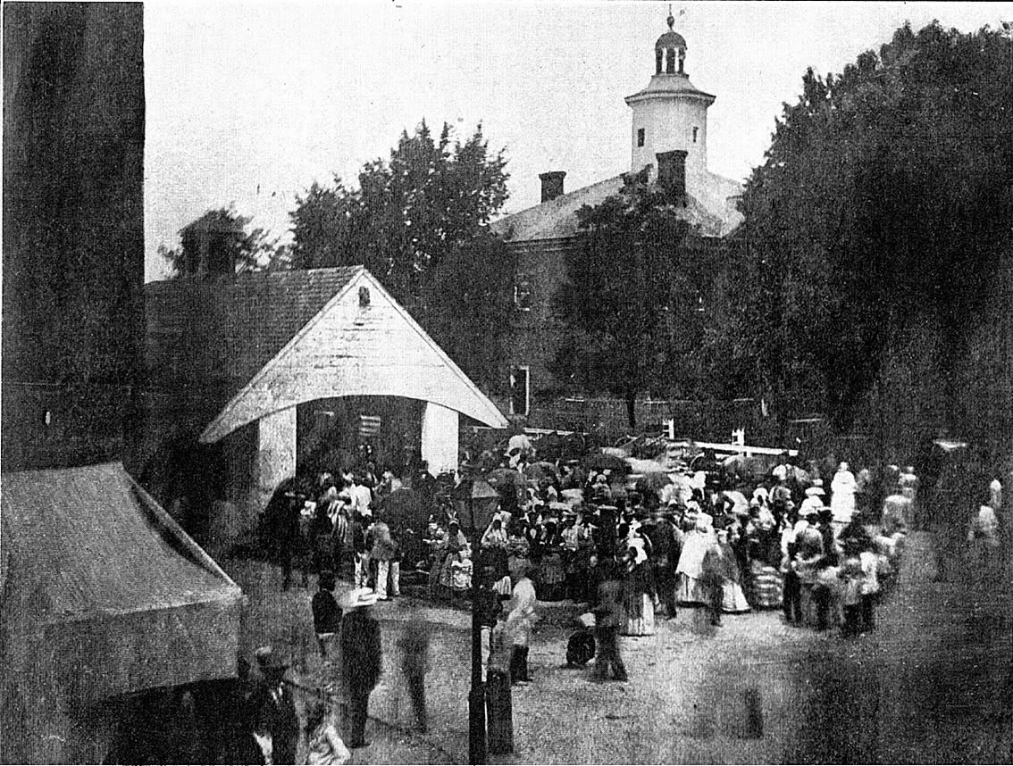 Spectators at a slave auction in the town square of Easton, Maryland, 1850's.