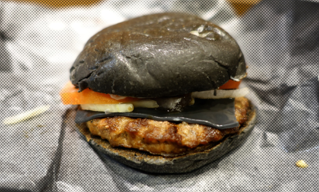 Squid-ink infused black burger at Burger King in Japan.