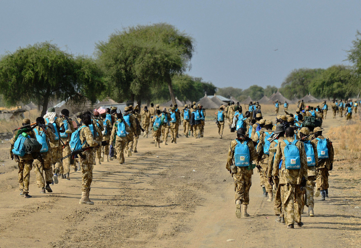 South Sudanese soldiers photographed wearing donated UN backpacks meant for children.