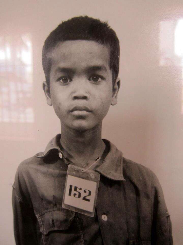 Cambodia s22 genocide victim. They pined the letter through the neck. He is one of 1.5 million citizens tagged, documented, and executed by the Khmer Rouge for the crime of "being educated"
