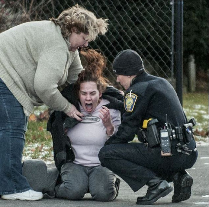 The picture of a woman that just learned that her fiance was murdered.
