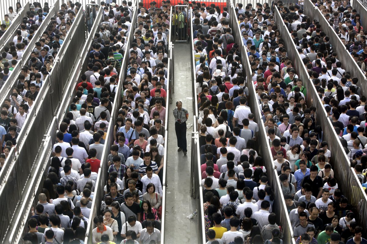 The security checks during rush hour in Beijing make for insanely long lines. The checks have been tightened due to an attack in China's Xinjiang region, where dozens were killed on May 22.
