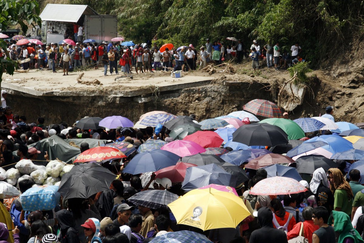 Commuters were stranded after a 2009 typhoon washed out a chunk of a Philippines highway north of Manila.