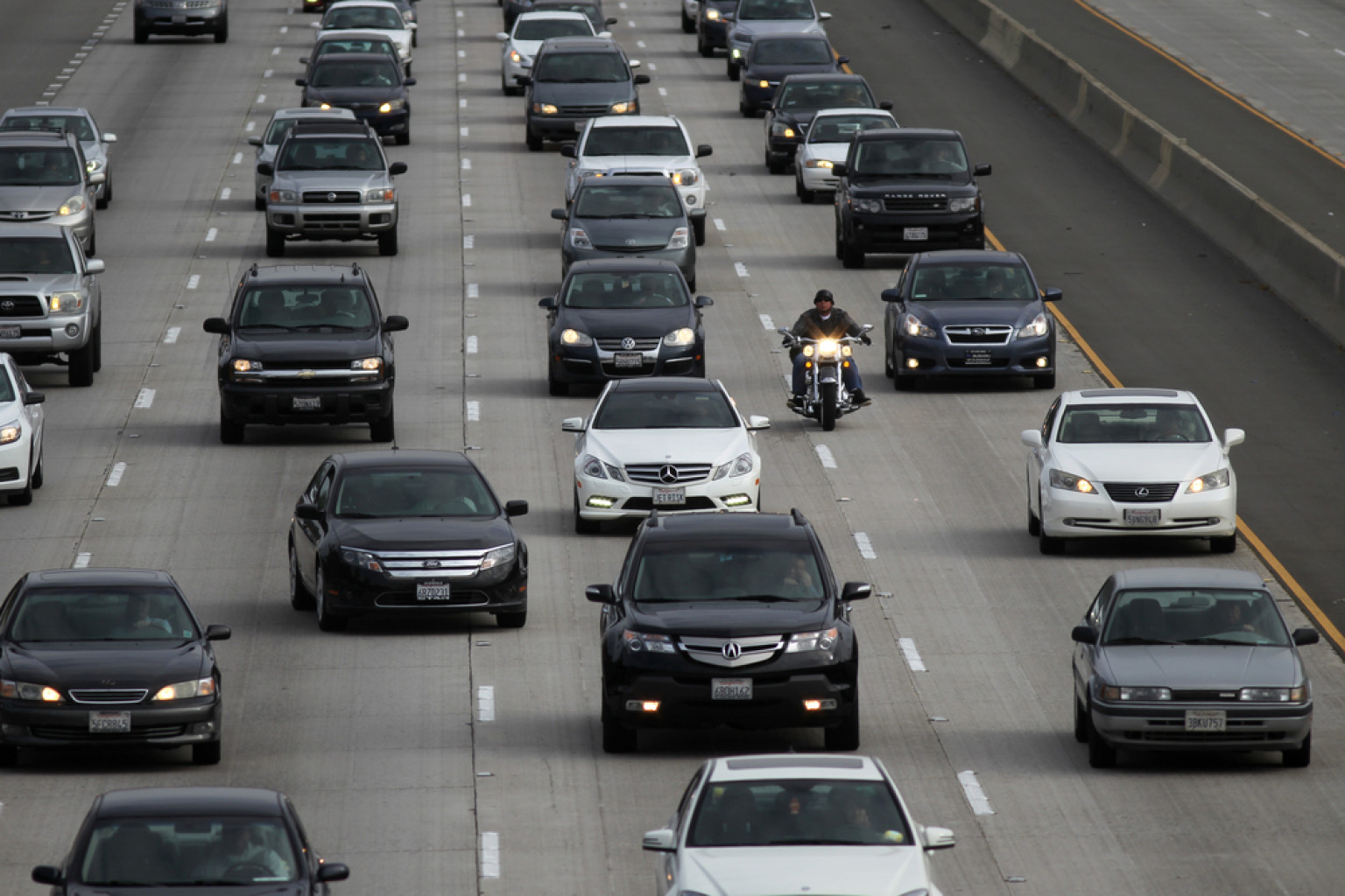 Los Angeles motorists suffer from the worst traffic in the US, logging 90 hours a year behind the wheel.