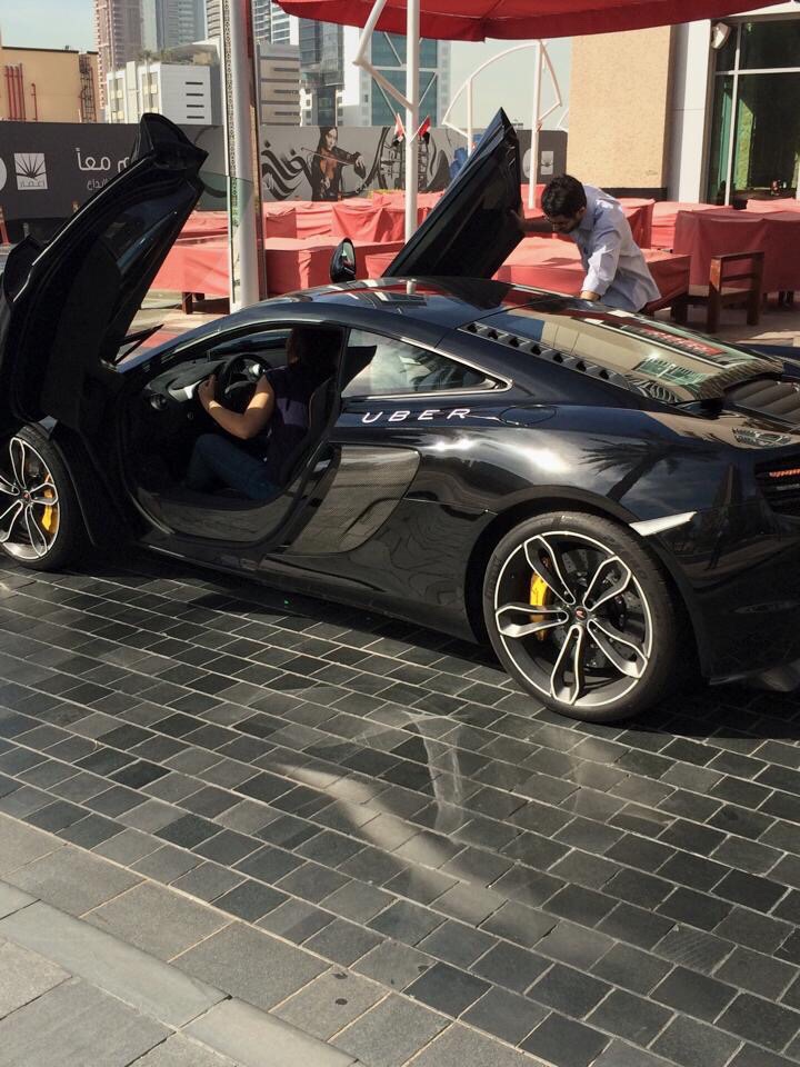 An Uber Mclaren picking up someone from his hotel in Dubai.