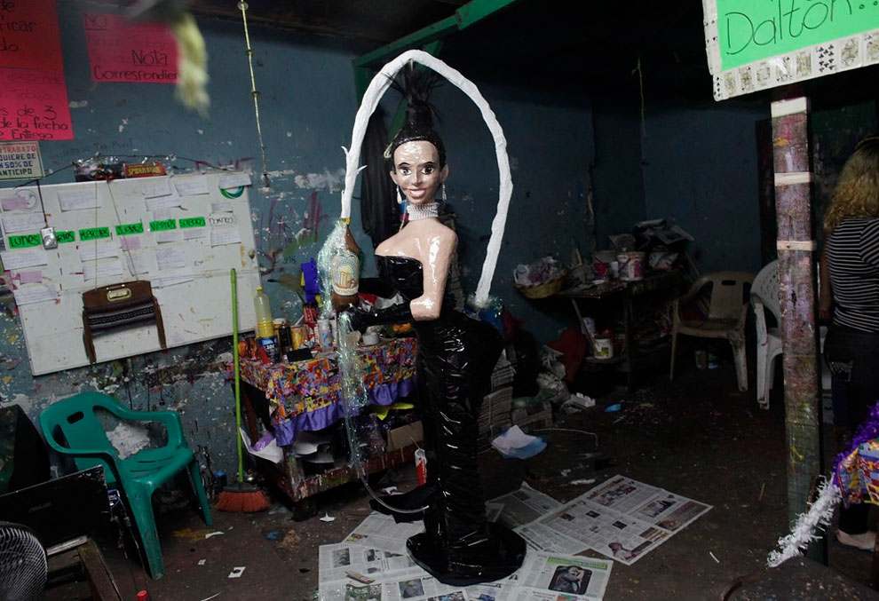 A pinata depicting TV celebrity Kim Kardashian is seen inside a workshop in Reynosa on December 6th. Mexican artisan Dalton Ramirez, known in his neighborhood for creating pinatas which depict local politicians and people in the entertainment industry.
