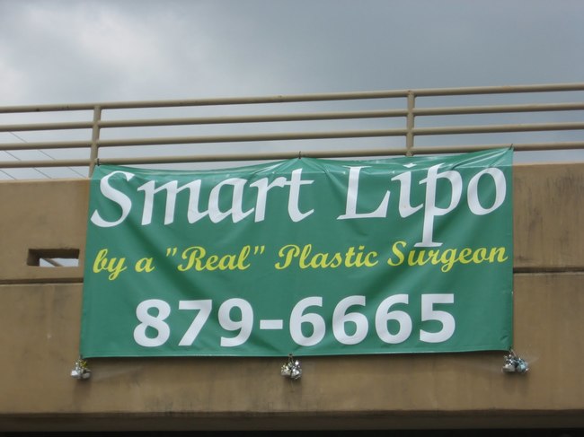 street sign - Smart Lipo by a "Real" Plastic Surgeon 8796665