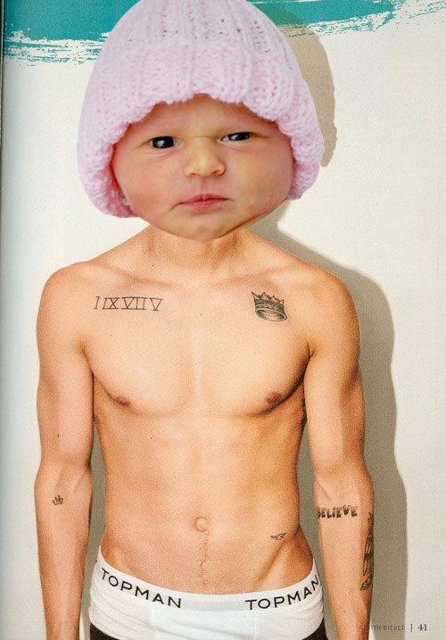 Baby Bieber wears his pink beanie in support of boobie cancer awareness month.