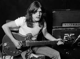 Malcom Young used to play the solos for ACDC until one day he told his brother Angus, "You do them, cuz they keep my drinking hand busy."
