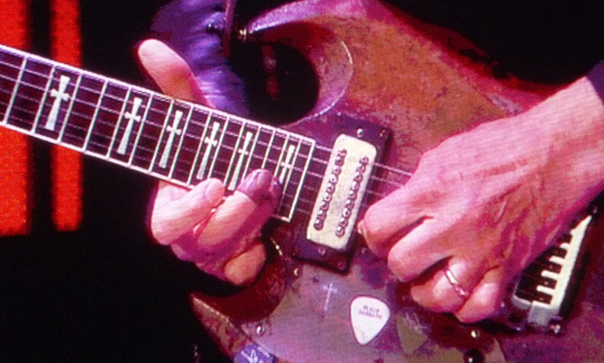 Black Sabbath's guitarist, Tony Iommi, lost part of two fingers in a "work accident", and it seemed the band was over. However, he managed to continue playing using a device which made his two stump fingers "longer", and tuning the guitar three steps down in order to loosen the strings and bend them more easily. The first song he made this way he titled "Iron Man"