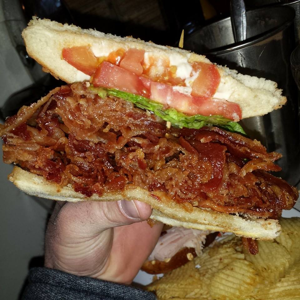 Me eating Crown Candy Kitchen's BLT in St.Louis MO.  One sandwich. 1lb of Bacon..Pure Awesomeness
