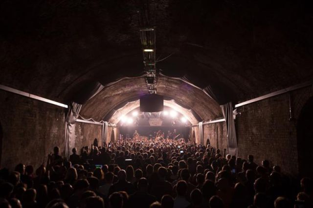 The Foo Fighters performing a secret show in an abandoned train tunnel