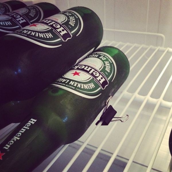 Use a paper clip to keep your beer from sliding in the fridge.