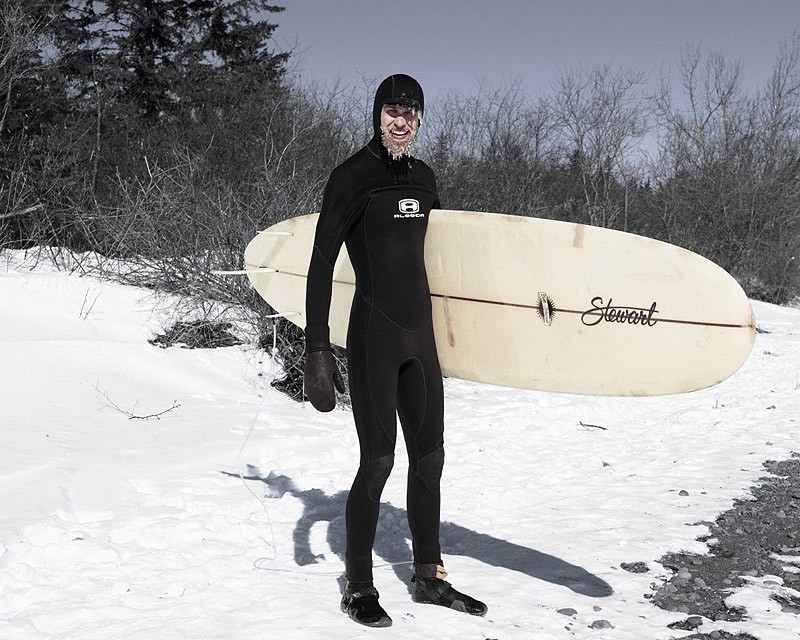 In the north of the United States(Minnesota) - the last place where you can surf, especially in winter. However, the real fans of surfing - practice this summer sport even in half-frozen waters of Lake Superior. 
more here: http://vulkom.com/surfing-the-icy-waves/