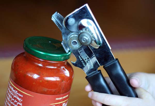 Use a bottle opener to open jars. Just lift the edge of the lid until you hear the pop, then unscrew normally.