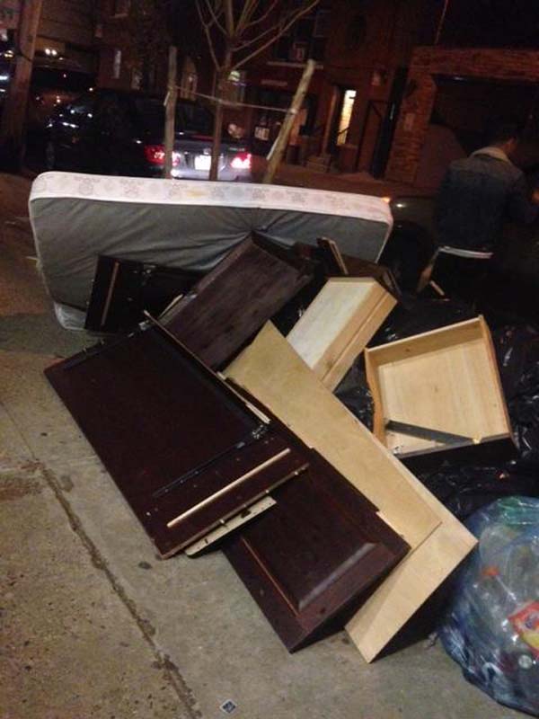 Since the roommate would no longer be there, the friends he abandoned went ahead and destroyed his stuff and set it on the curb.