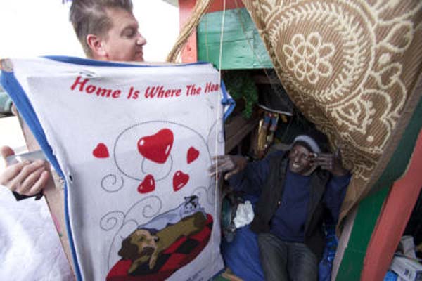 He uses what he collects to build small, one room shelters for the homeless.