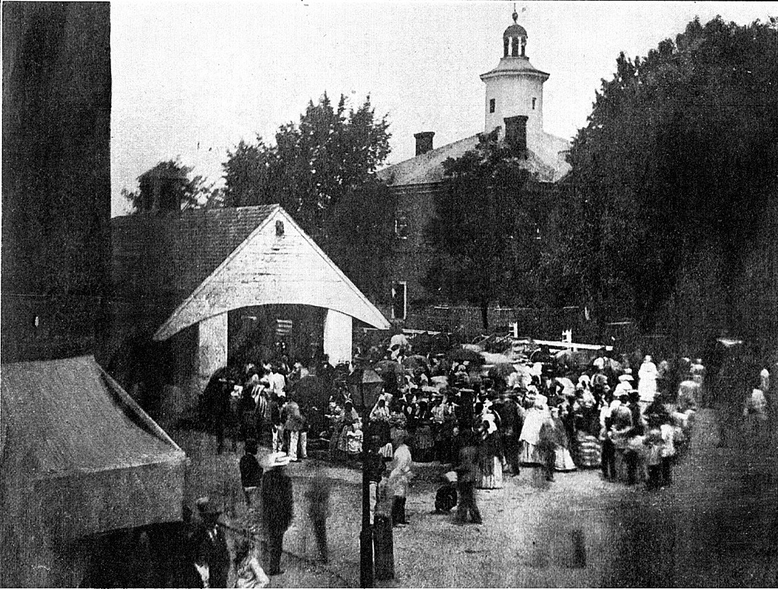 Spectators at a slave auction in the town square of Easton, Maryland, c. 1850’s