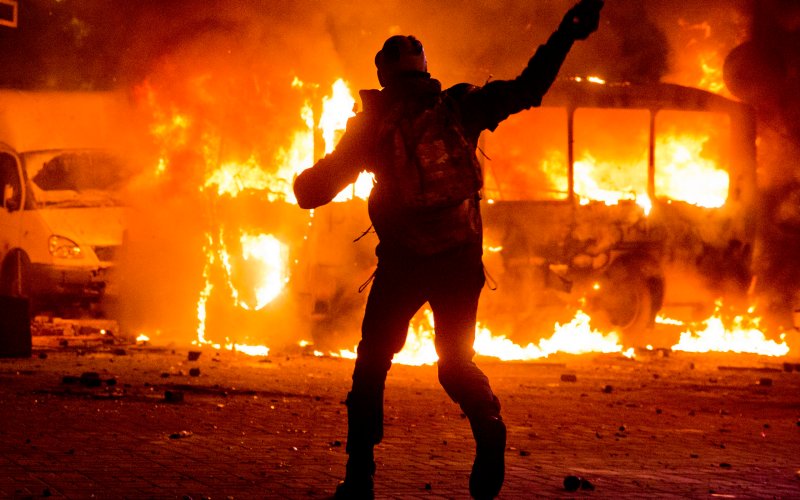 riot police lit on fire in Ukraine revolt