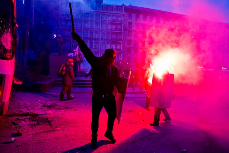riot police lit on fire in Ukraine revolt