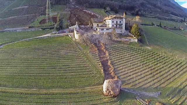 boulder destroys building in Italy, another missed by inches