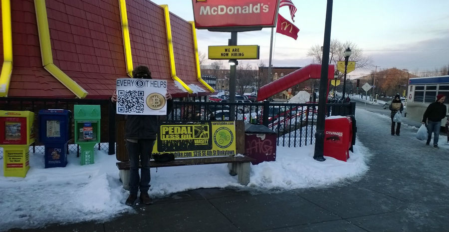 Found a guy begging for bitcoins outside McDonalds in Minneapolis MN I wonder if he noticed the sign behind him that says now hiring?