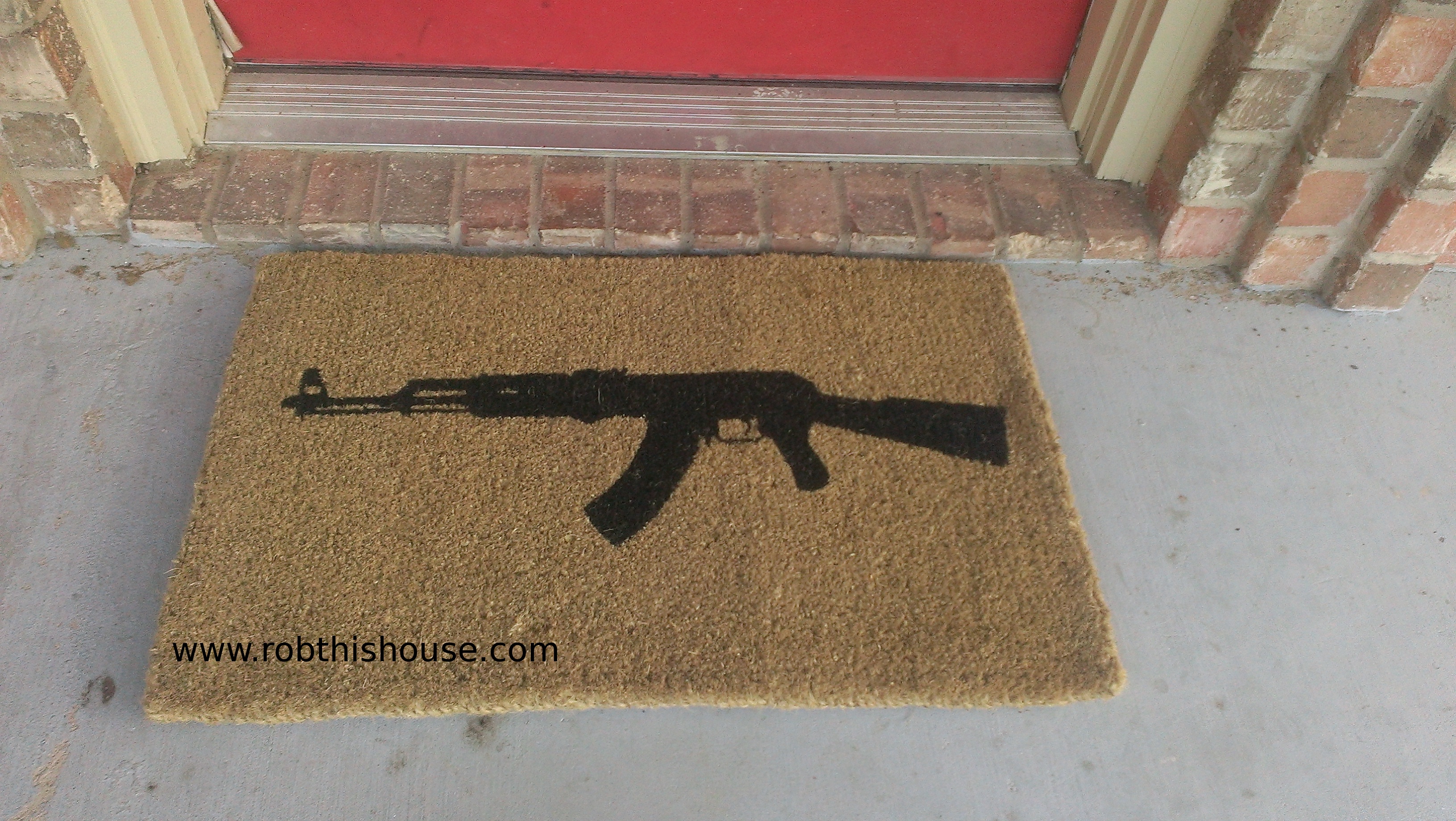 AK 47 Unwelcome mat from www.robthishouse.com  Pretty unique.