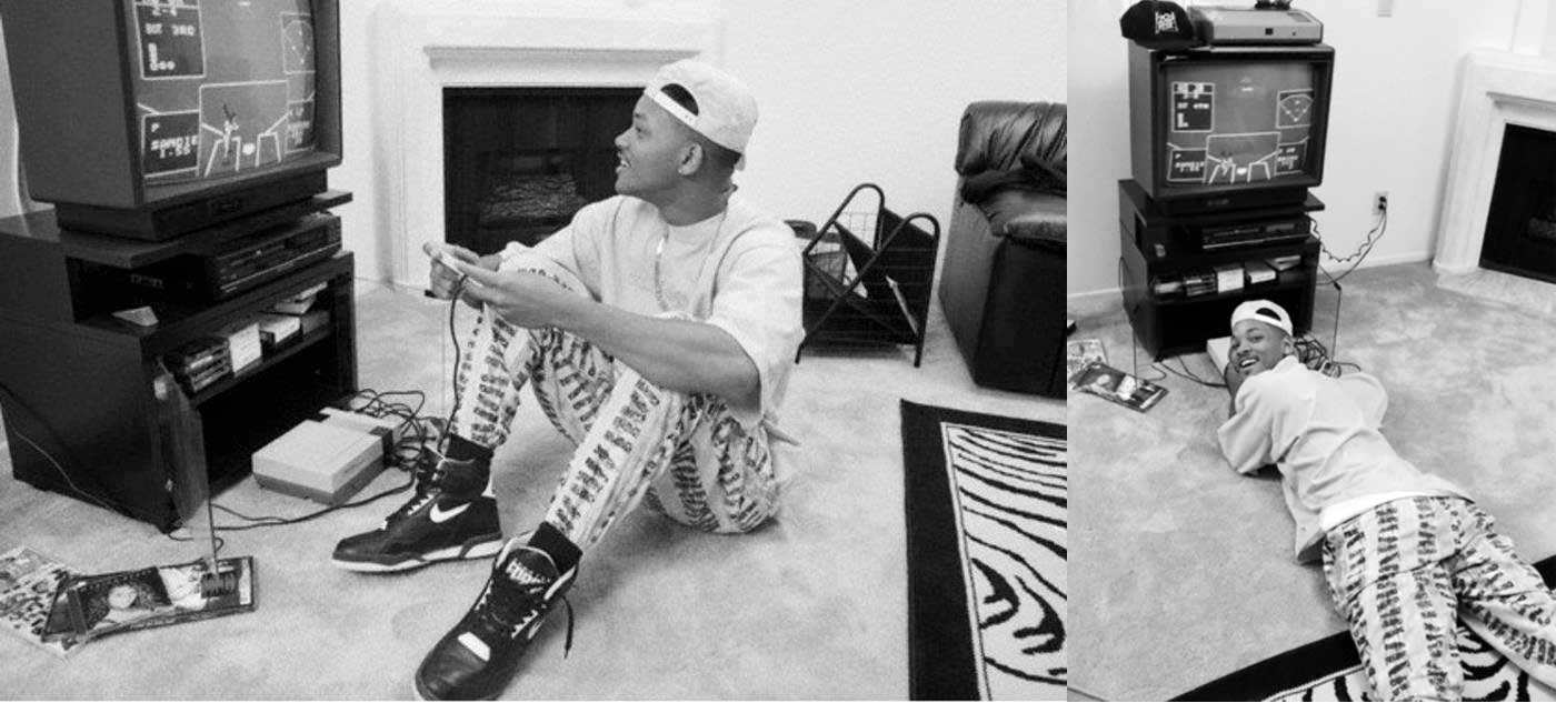 A young Will Smith playing a baseball game on his Nintendo.