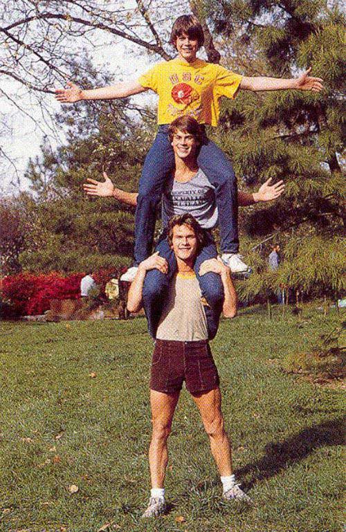 Patrick Swayze, Rob Lowe and C. Thomas Howell on the set of The Outsiders.