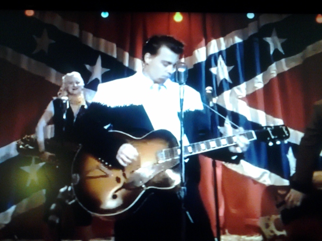 Cry baby sings to his lady.Screen snapshot. More to come moments in movie time.