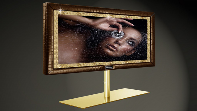 This TV is the PrestigeHD Supreme Rose Edition and is worth 2.3 million dollars. Covered in alligator skin and studded with an obnoxious amount of diamonds.
