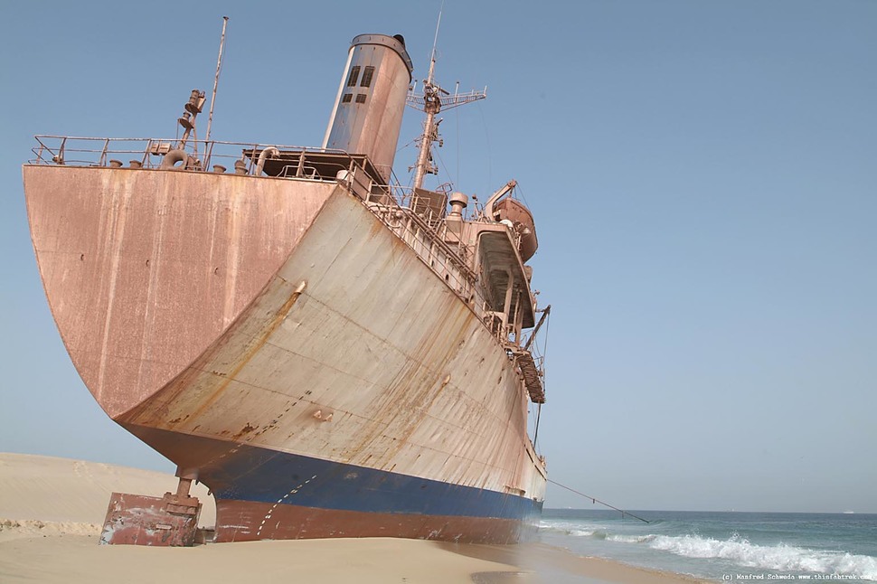 Nouadhibou Ship Cemetery Mauritania, Africa - The surreal port of Nouadhibou is home to more than 300 decaying ships, making it the largest ship graveyard in the world. Corrupt officials have allowed the illegal dumping of ships here for years.