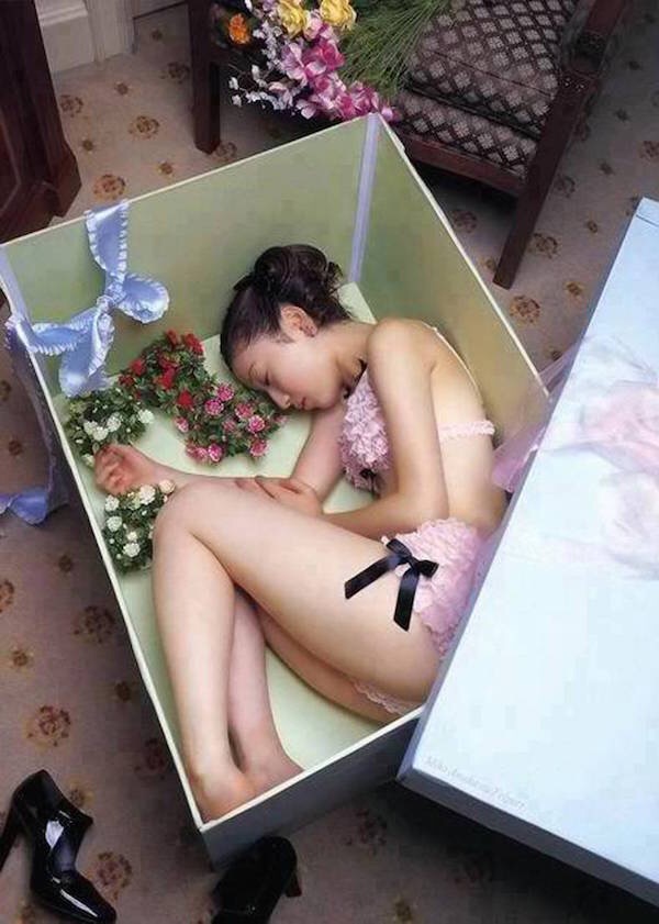 naked asian girl in a box