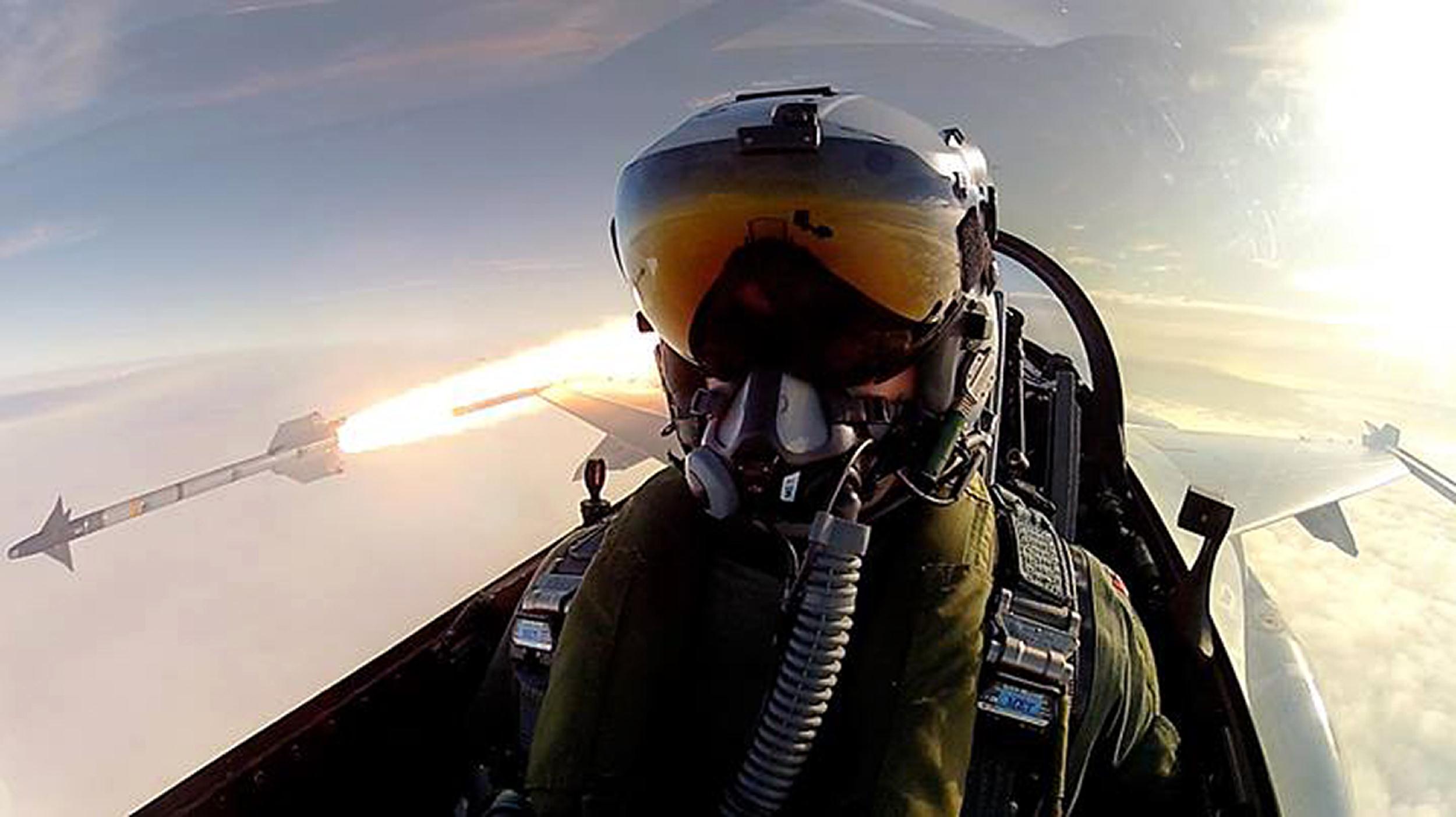 Yep, makes sense to meHes in a fighter plane firing missiles and taking selfieswhats not to understand?