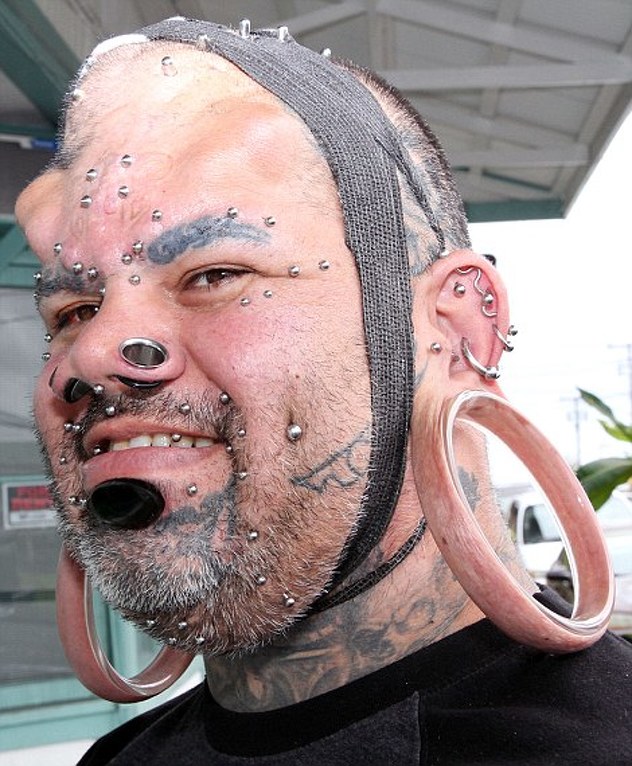 He has hundreds of other body adaptations, including horn implants and face tattoos