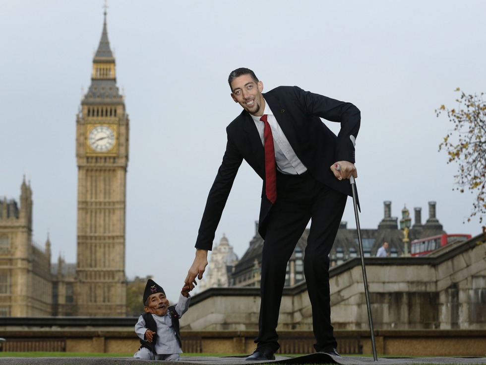 The world’s shortest man greets the world’s tallest man. Kosen stands at a giant 8 feet tall, whereas Dangi is 1.8 feet tall.