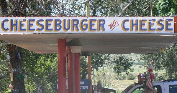 redundant sign - L A Suboueese Cheeseburger Hite Cheese De Tion