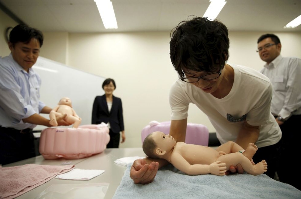 Tayama, Kurita and Inoue take part in a "Ikumen" course, or child-rearing course for men, in Tokyo, Japan