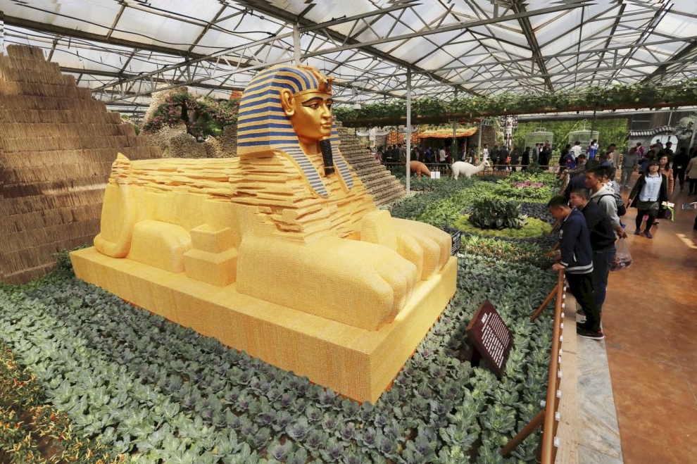 A replica of the Sphinx, which is partly made of cereals, is seen during an exhibition in Shouguang, Shandong Province, China