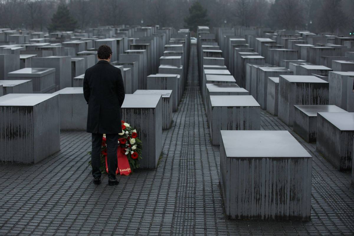 Justin Trudeau laying a wreath at the memorial for murdered Jews in Berlin