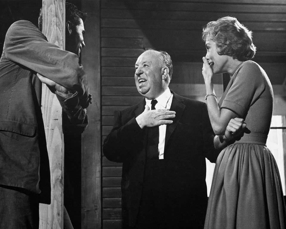 Anthony Perkins, Alfred Hitchcock and Janet Leigh in a casual moment on the set of Psycho.