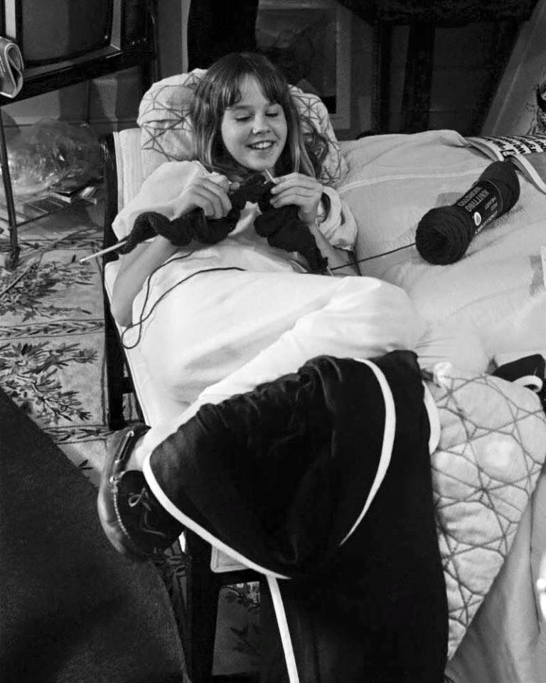 Linda Blair knitting during a break in filming on the set of The Exorcist, 1972/3ish.