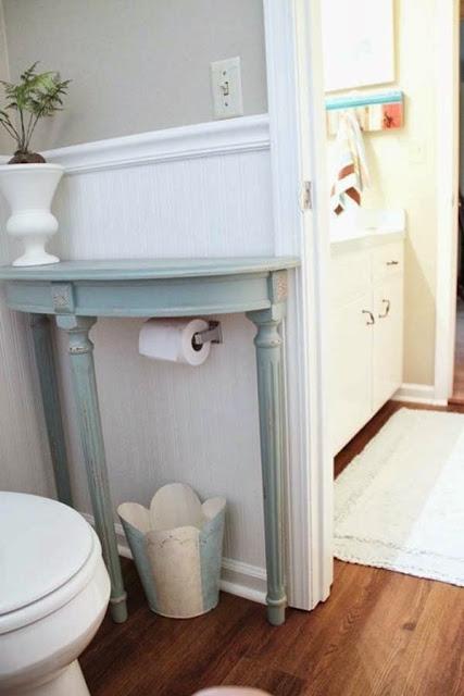 Add a half-table to your bathroom for extra storage space.
