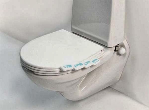Buy a toilet seat where everyone can have their own tab.