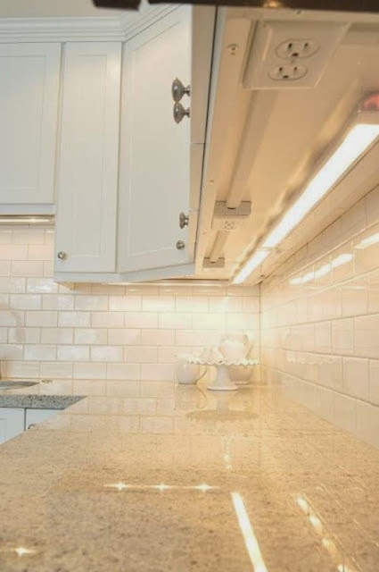 Install your outlets underneath your cabinets so you dont ruin your backsplash.