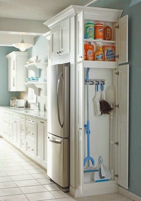 Add a small cabinet to extra space in the kitchen for cleaning supply storage.
