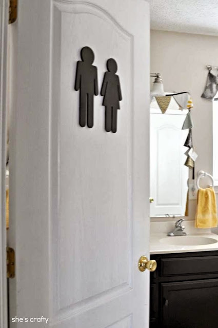 Put a sign on your bathroom so guests know where it is.