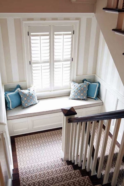 Add a simple window seat to the landing of your staircase.